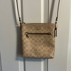 Coach Beige Crossbody Bag with Gold Accents